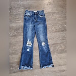 Risen Distressed Dark Blue Flare Jeans with Raw Hem